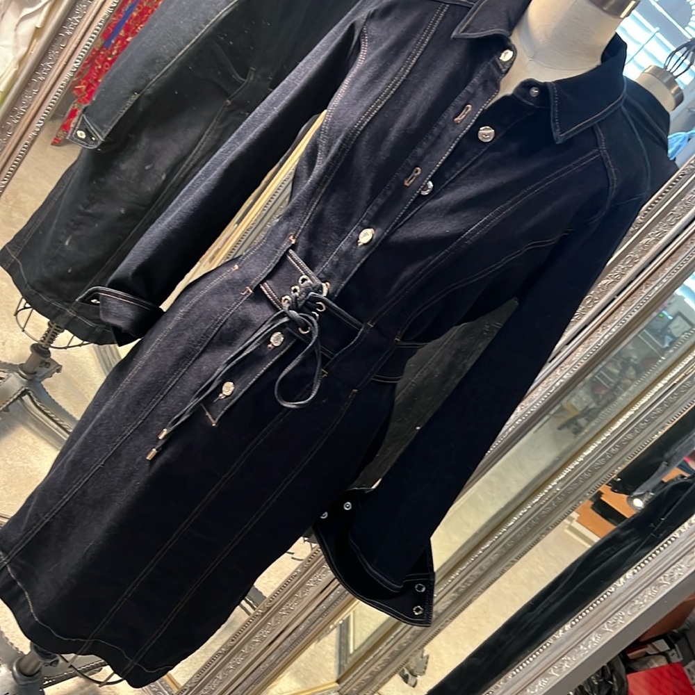 denim dress stretch, fabric, silver buttons.  Tie waist.